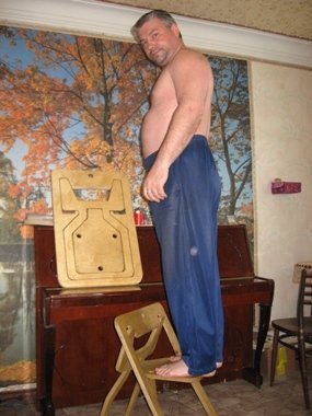 يمكن طي كرسي الخشب الرقائقي دعم وزن شخص بالغ