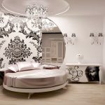 Pyöreä sänky asetetaan moderniin design-makuuhuoneeseen