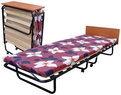 hopfällbar säng med madrass på bältena