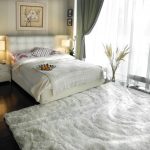 Orchidee met slaapkamer en een bed met zachte rug