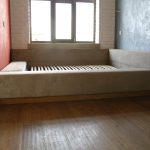 Loft-stil sovrum med inbyggd säng