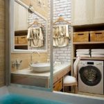 Design del bagno con una lavatrice in un armadio aperto