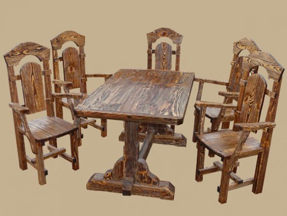 כסאות מגולפים ושולחן