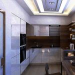 Armoires de cuisine jusqu'au plafond dans une cuisine intégrée moderne