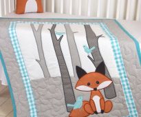 Mis au lit avec des renards - une couverture et un oreiller