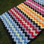 Bloemmotief voor een veelkleurig doe-het-zelf tapijt