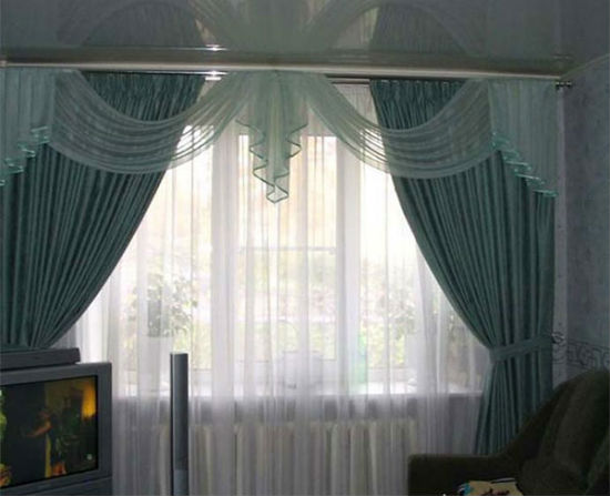 Väggfäste för gardiner