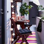 Zwarte kussens voor balkonstoelen