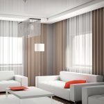 Design del soggiorno con due divani bianchi