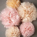 pompons van designer servetten perzik