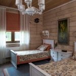 Camera da letto per bambini in una casa di legno