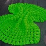 selimut pompon hijau terang
